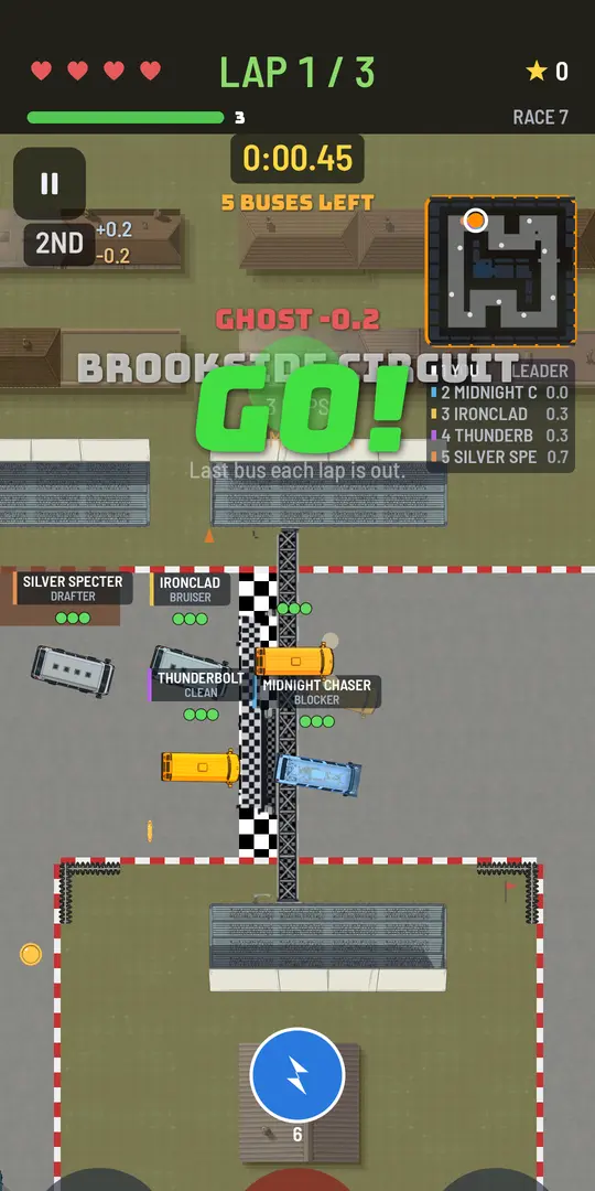 Rival buses on the starting grid